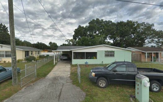 Foto 1 de propiedad embargada en 4214 E Grove Ave Tampa FL
